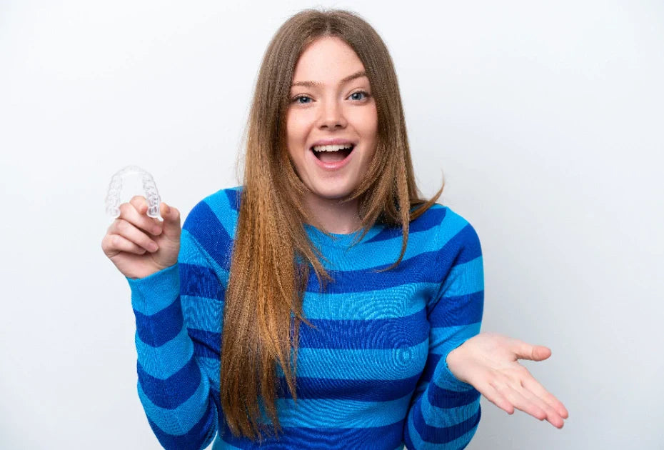 Teen smiling with invisible aligners showing confidence and comfort